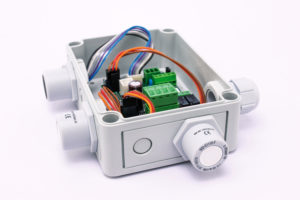 Electronic device with a white housing, cables and sensors