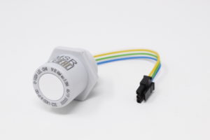 White housing with coloured cables and a black adapter