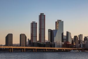Skyscrapers, towers, blue sky, sunset and water