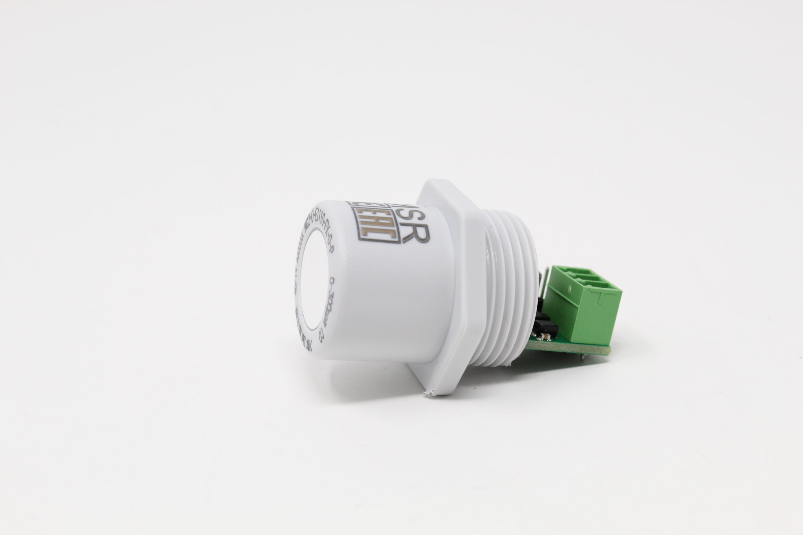 Weißer Sensor mit grünem Adapater